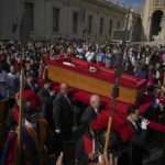 The body of Pope Francis is carried into St. Peter's Basilica at the Vatican, where he would lie in state for three days.